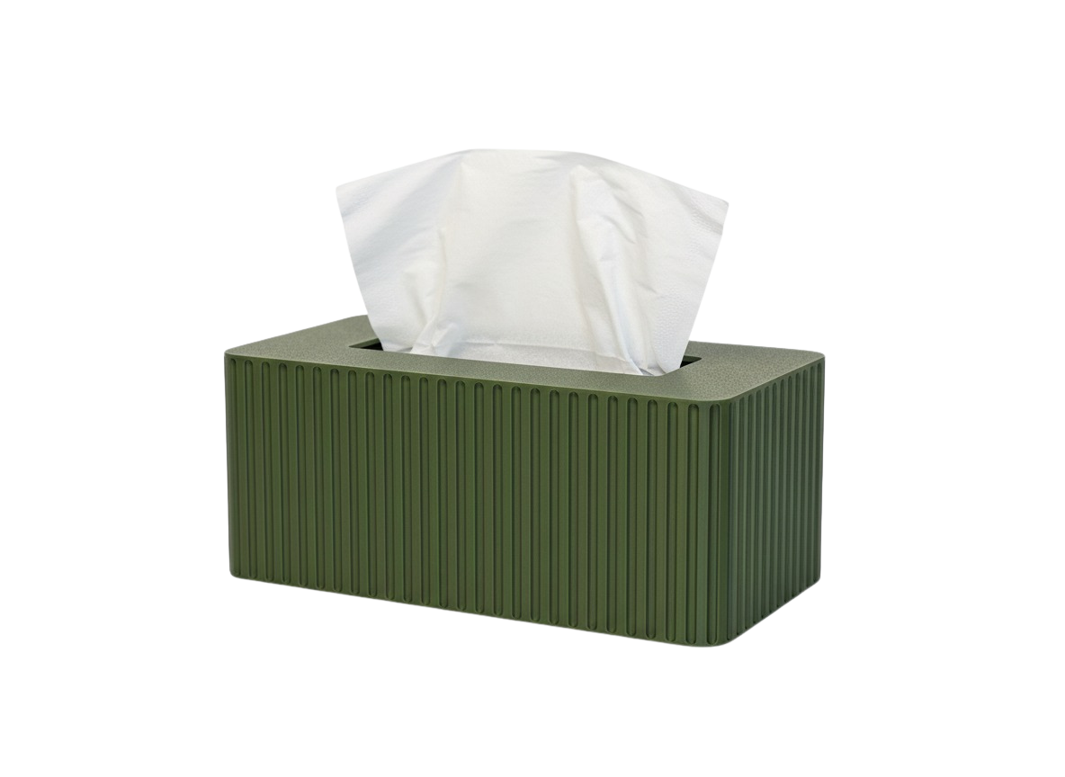 Green tissue box with fluted texture on a white background