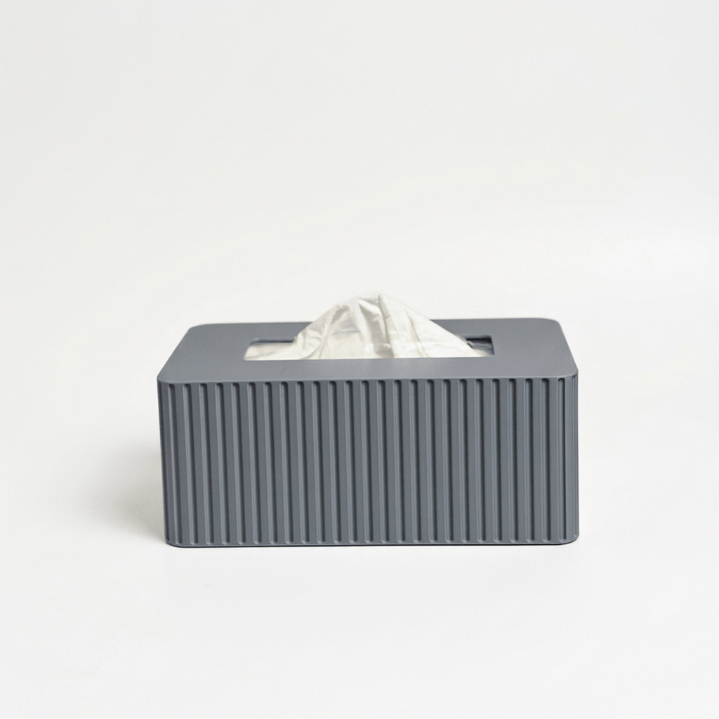 Gray fluted tissue box cover styled on a kitchen counter
