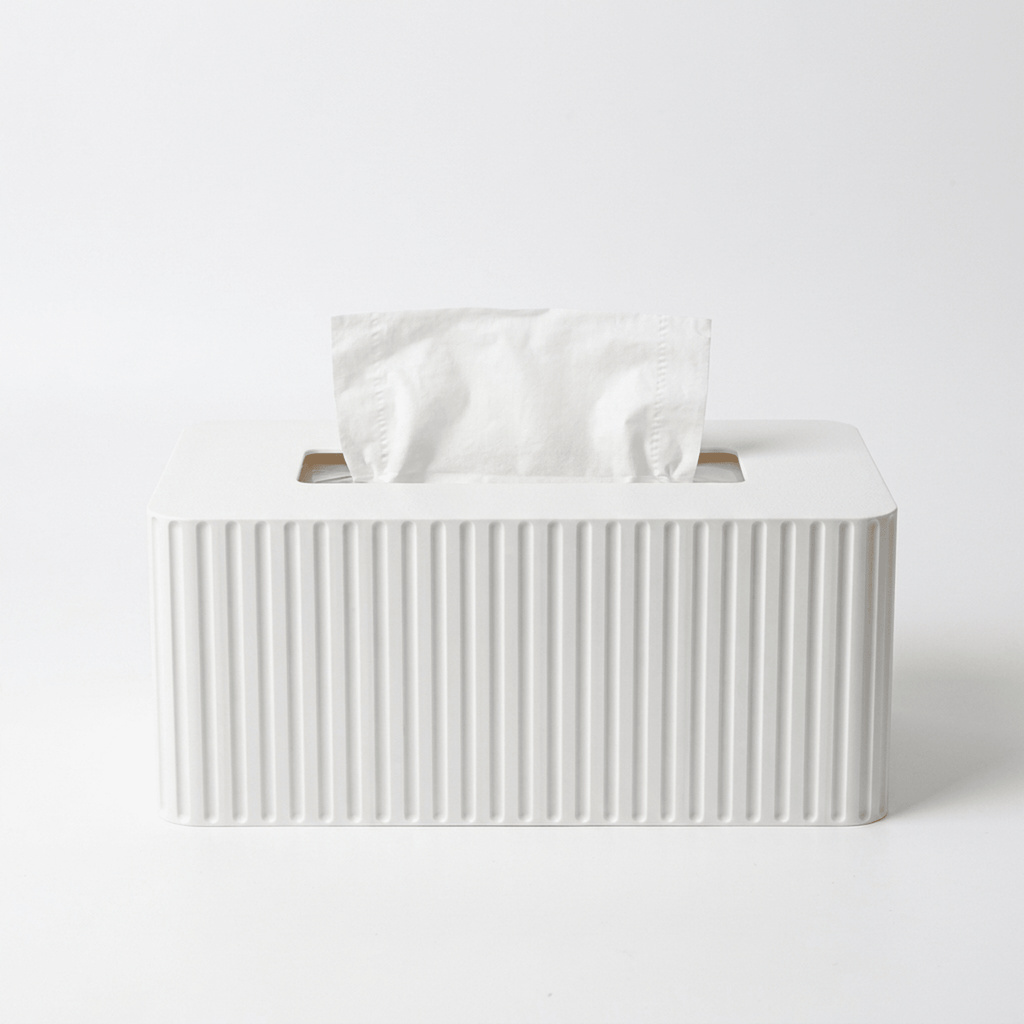 White fluted tissue box cover on a light gray background